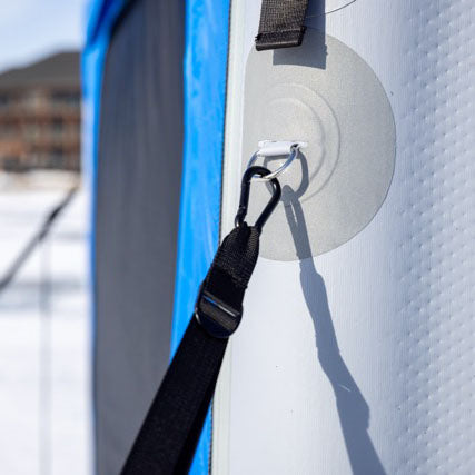 Secure shelter with tie down straps